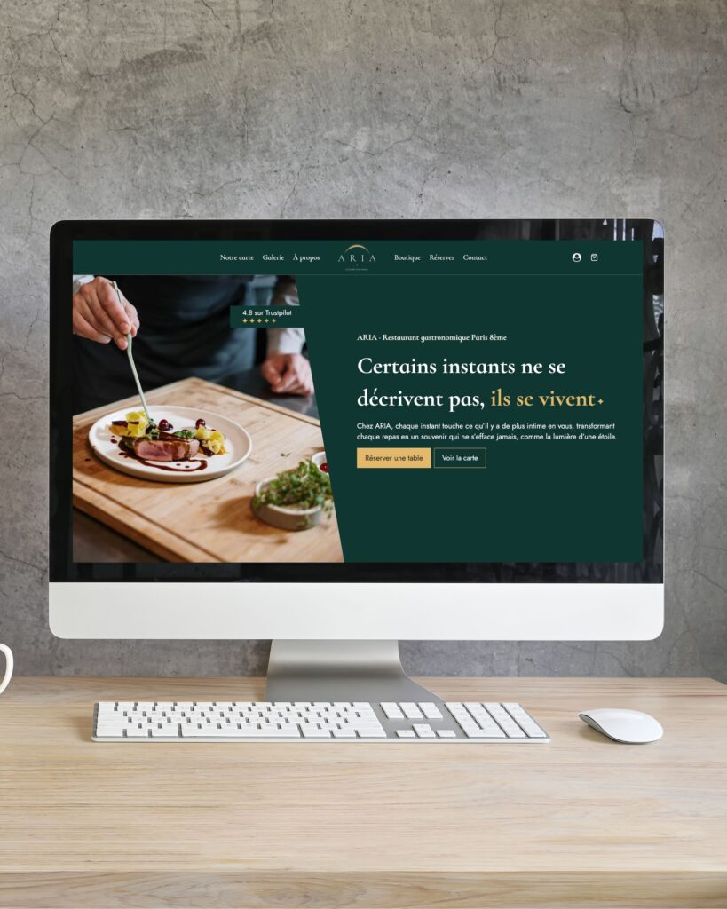 Mockup d'un ordinateur montrant la page d'accueil du site de démonstration ARIA Restaurant.